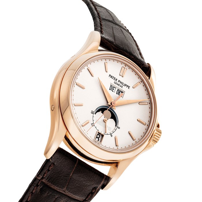 PATEK PHILIPPE. A FINE AND VERY RARE 18K PINK GOLD LIMITED EDITION AUTOMATIC ANNUAL CALENDAR WRISTWATCH WITH SWEEP CENTRE SECONDS, MOON PHASES AND 24 HOURS INDICATION , MADE TO COMMEMORATE THE 125TH ANNIVERSARY OF WEMPE SIGNED PATEK PHILIPPE, GENEVE, NO. 112/125, REF. 5125, MOVEMENT NO. 3’360’030, CASE NO. 4’213’720, MANUFACTURED IN 2003