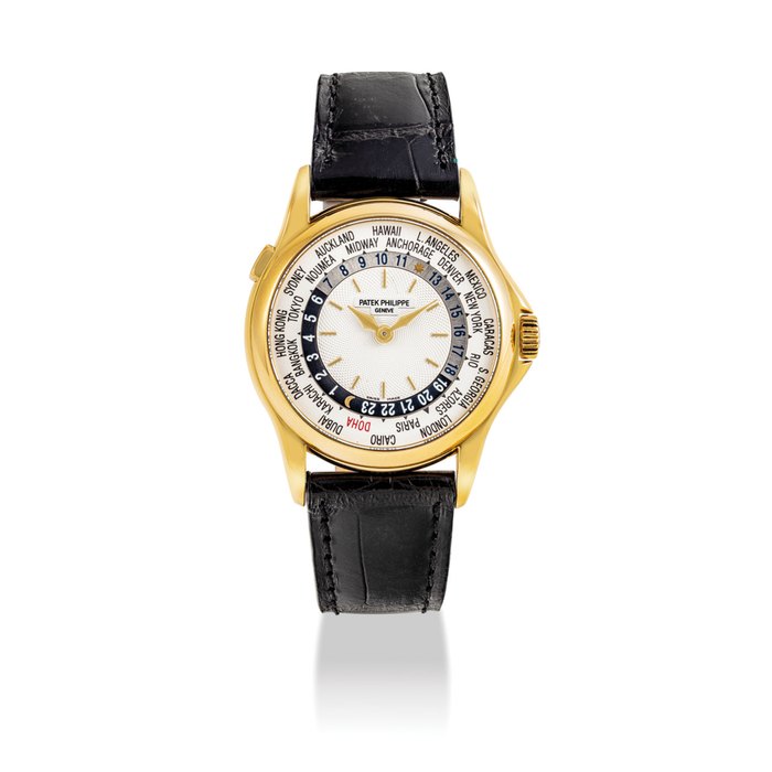 PATEK PHILIPPE. A VERY RARE AND FINE 18K GOLD AUTOMATIC WORLD TIME WRISTWATCH SIGNED PATEK PHILIPPE, REF. 5110 DOHA, MOVEMENT NO. 3'206'415, CASE NO. 4'099'672, MANUFACTURED IN 2000