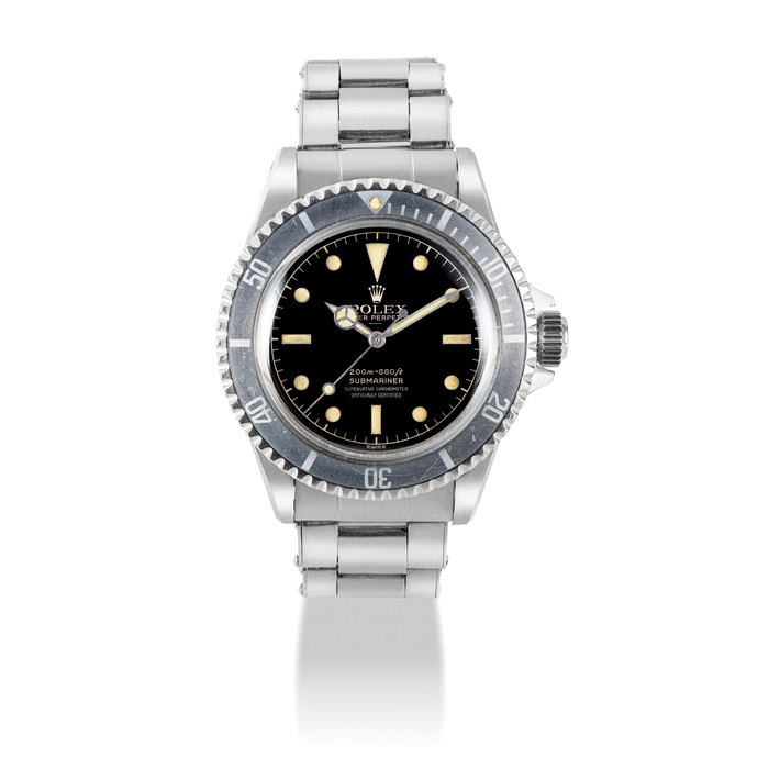 ROLEX. A VERY RARE AND FINE STAINLESS STEEL AUTOMATIC WRISTWATCH WITH SWEEP CENTRE SECONDS, POINTED CROWN GUARDS, BRACELET AND GILT UNDERLINE DIAL SIGNED ROLEX, OYSTER PERPETUAL, SUBMARINER MODEL, REF. 5512, CASE NO. 870'024, CIRCA 1963