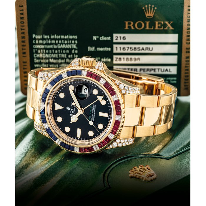 Rolex ROLEX. A FINE AND VERY RARE 18K GOLD, DIAMOND, SAPPHIRE AND RUBY-SET AUTOMATIC DUAL TIME WRISTWATCH WITH SWEEP CENTRE SECONDS, DATE AND BRACELET SIGNED ROLEX, OYSTER PERPETUAL, GMT-MASTER II, REF. 116758SARU, CASE NO. Z818898, CIRCA 2006 · 116758SARU