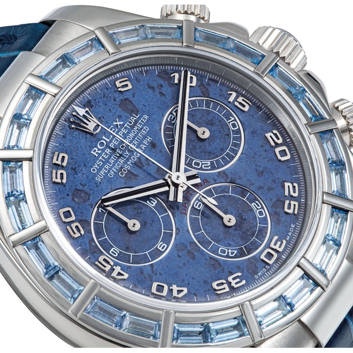 ROLEX. A RARE AND FINE 18K WHITE GOLD AND SAPPHIRE-SET AUTOMATIC CHRONOGRAPH WRISTWATCH WITH SODALITE DIAL SIGNED ROLEX, OYSTER PERPETUAL, COSMOGRAPH DAYTONA MODEL, REF. 116589, CASE NO. K590550, CIRCA 2005