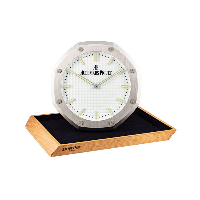 Audemars Piguet AUDEMARS PIGUET. AN UNUSUAL STAINLESS STEEL OCTAGONAL WALL CLOCK SIGNED AUDEMARS PIGUET, CIRCA 2000, Price & Market Data