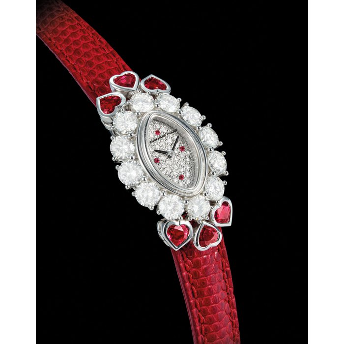 Audemars Piguet AUDEMARS PIGUET. A LADY'S FINE AND RARE 18K WHITE GOLD, DIAMOND AND RUBY-SET NAVETTE-SHAPED WRISTWATCH SIGNED AUDEMARS PIGUET, REF. 66683BC, CASE NO. D35334, CIRCA 1995, Price & Market Data