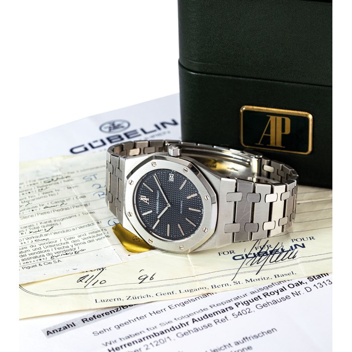 AUDEMARS PIGUET. A FINE AND RARE STAINLESS STEEL AUTOMATIC WRISTWATCH WITH DATE AND BRACELET SIGNED AUDEMARS PIGUET, ROYAL OAK MODEL, REF. 5402, NO. D1313, MOVEMENT NO. 213’535, CIRCA 1983
