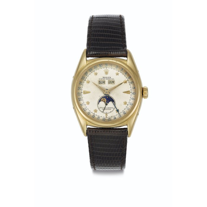 Rolex Rolex. An Extremely Fine and Very Early 18k Gold Automatic Triple Calendar Wristwatch with Star Dial and Moon Phases Signed Rolex, Oyster Perpetual, Officially Certified Chronometer, Ref. 6062, Case No. 579’781, Circa 1948 · 6062
