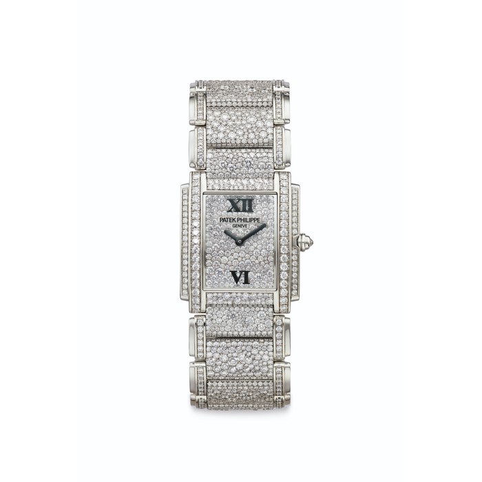 Patek Philippe Patek Philippe. A Very Fine and Attractive 18k White Gold and Diamond-set Bracelet Watch Signed Patek Philippe, Genève, Twenty-Four Model, Ref. 4910/52, Movement No. 3'596'606, Case No. 4'464'695, Manufactured in 2009, Price & Market Data