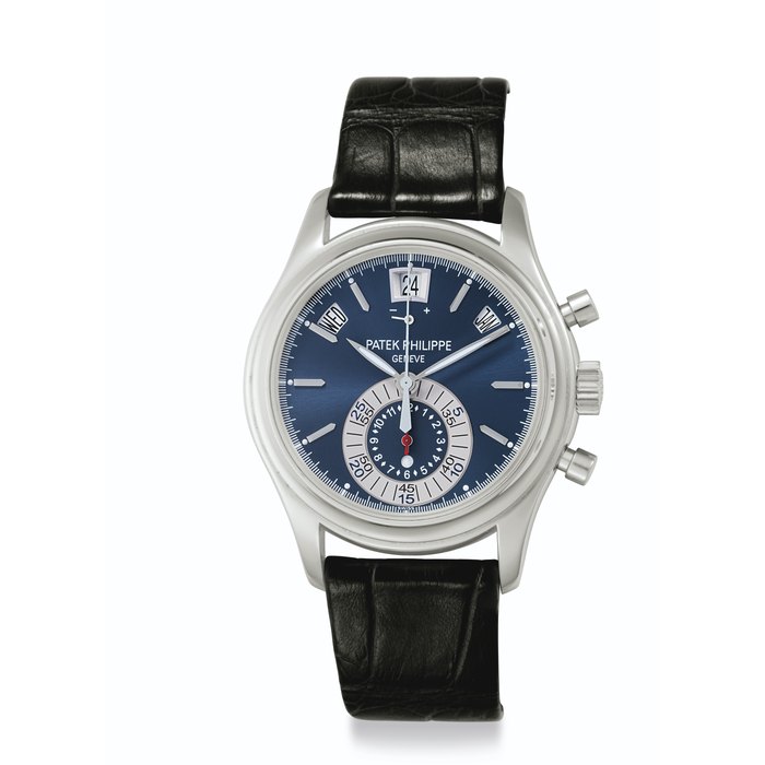 Patek Philippe. A Fine Platinum Automatic Annual Calendar Flyback Chronograph Wristwatch with Day/Night Display and Power Reserve, Factory Sealed Signed Patek Philippe, Genève, Ref. 5960P, Movement No. 5'543'419, Case No. 4'518'299, Manufactured in 2010