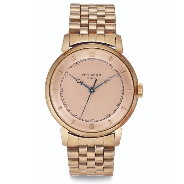 Patek Philippe. A Very Fine and Rare 18k Pink Gold Wristwatch with Pink Dial, Center Seconds and Bracelet Signed Patek Philippe, Geneve, Ref. 2482, Movement No. 702'299, Case No. 671'451, Manufactured in 1953