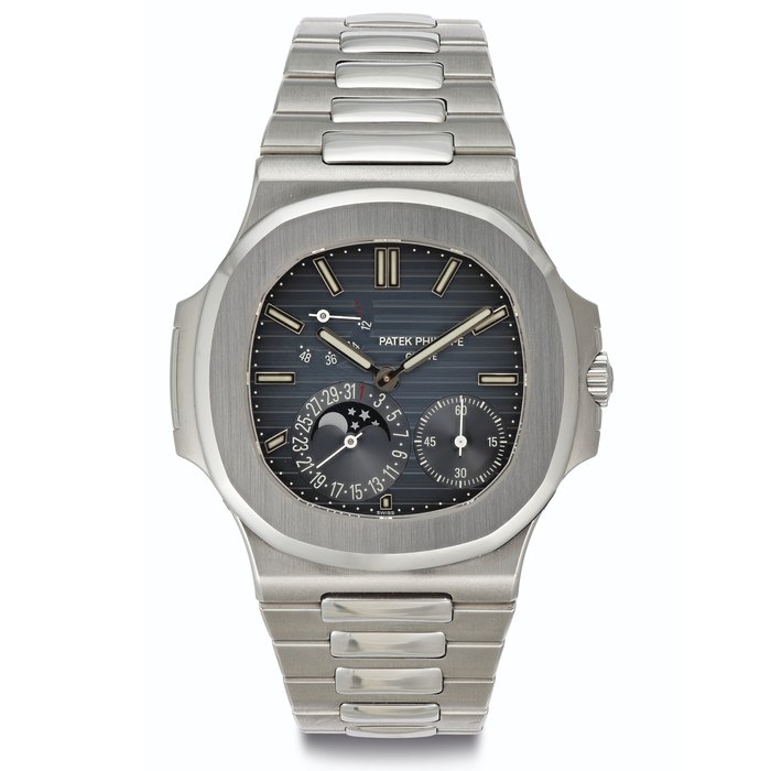 Patek Philippe. A Fine Stainless Steel Automatic Wristwatch with Date, Moon Phases, Power Reserve and Bracelet Signed Patek Philippe, Genève, Nautilus Model, Ref. 5712/1A, Movement No. 3176382, Case No. 4451545, Manufactured in 2008
