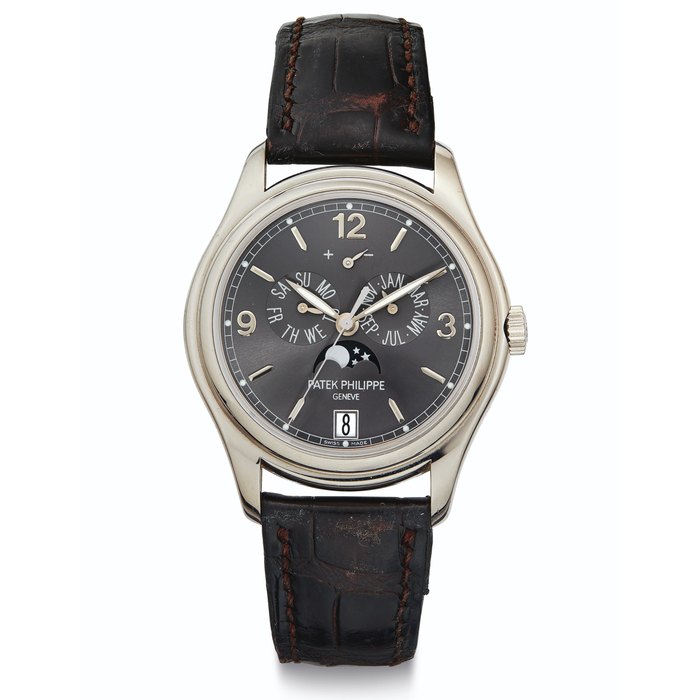 Patek Philippe. A Fine 18k White Gold Automatic Annual Calendar Wristwatch with Moon Phases, Power Reserve and Center Seconds Signed Patek Philippe, Genève, Ref. 5146G, Movement No. 3'803'955, Case No. 4'722'929, Manufactured in 2009