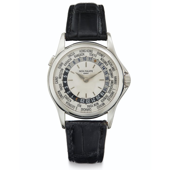 Patek Philippe. A Fine 18k White Gold Automatic World Time Wristwatch Signed Patek Philippe, Genève, Ref. 5110G, Movement No. 3'207'265, Case No. 4'142'074, Manufactured in 2001
