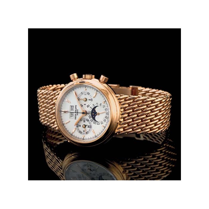 PATEK PHILIPPE. A FINE AND RARE 18K PINK GOLD PERPETUAL CALENDAR CHRONOGRAPH BRACELET WATCH WITH MOON PHASES SIGNED PATEK PHILIPPE, GENEVE, MOVEMENT NO. 3045102, CASE NO. 2870028, REF. 3970/2, MANUFACTURED IN 1994