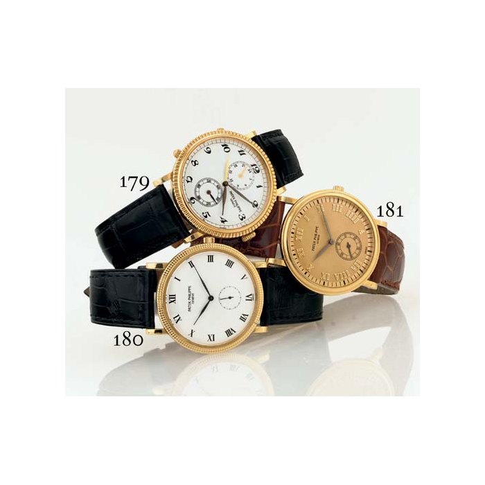PATEK PHILIPPE. A FINE 18K GOLD DUAL TIME ZONE WRISTWATCH SIGNED PATEK PHILIPPE, GENEVE, "TRAVEL TIME", MOVEMENT NO. 3083131, CASE NO. 4074198, REF. 5034, CIRCA 2000
