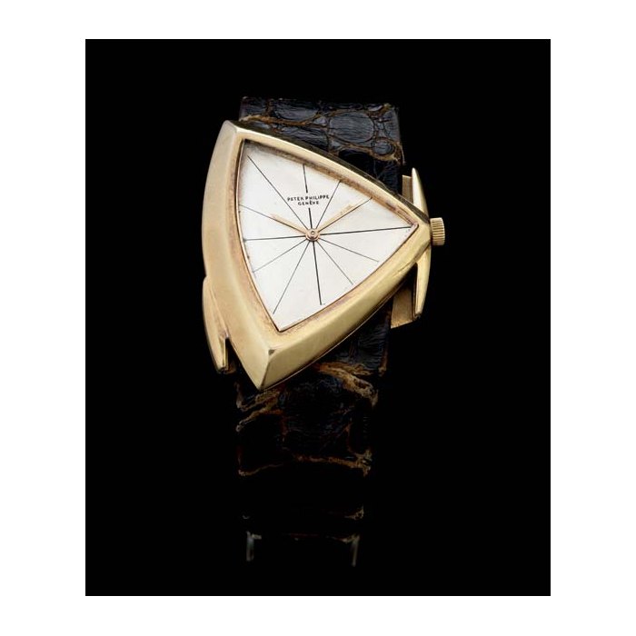 PATEK PHILIPPE. A RARE AND UNUSUAL 18K GOLD AYSMMETRICAL WRISTWATCH SIGNED PATEK PHILIPPE, GENEVE, MOVEMENT NO. 786295, CASE NO. 2615178, REF. 3412, MANUFACTURED IN 1961