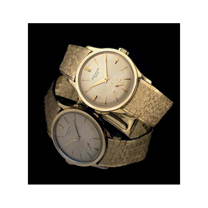 PATEK PHILIPPE. A FINE AND VERY RARE LARGE 18K GOLD DUAL TIME ZONE WRISTWATCH WITH GILT DIAL SIGNED PATEK PHILIPPE, GENEVE, MOVEMENT NO. 739726, CASE NO. 311343, REF. 2597, MANUFACTURED IN 1963