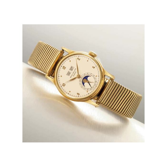 PATEK PHILIPPE. A RARE 18K GOLD PERPETUAL CALENDAR WRISTWATCH WITH PHASES OF THE MOON SIGNED PATEK PHILIPPE, GENEVE, MOVEMENT NO. 962285, CASE NO. 655687, REF. 1526, MANUFACTURED IN 1948