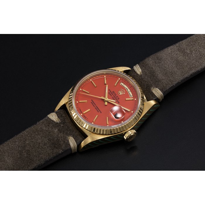 ROLEX, A GOLD OYSTER PERPETUAL DAY-DATE WITH ORANGE STELLA DIAL AND ARABIC CALENDAR, REF. 18038 CASE NUMBER: 9’380’113, MOVEMENT NUMBER: 1’638’713