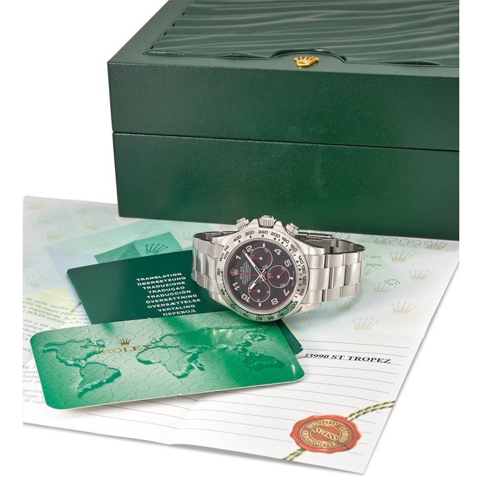 ROLEX. A FINE 18K WHITE GOLD AUTOMATIC CHRONOGRAPH WRISTWATCH WITH ORIGINAL GUARANTEE AND BOX SIGNED ROLEX, OYSTER PERPETUAL, COSMOGRAPH, DAYTONA, REF. 116509, CASE NO. Z070999, CIRCA 2006