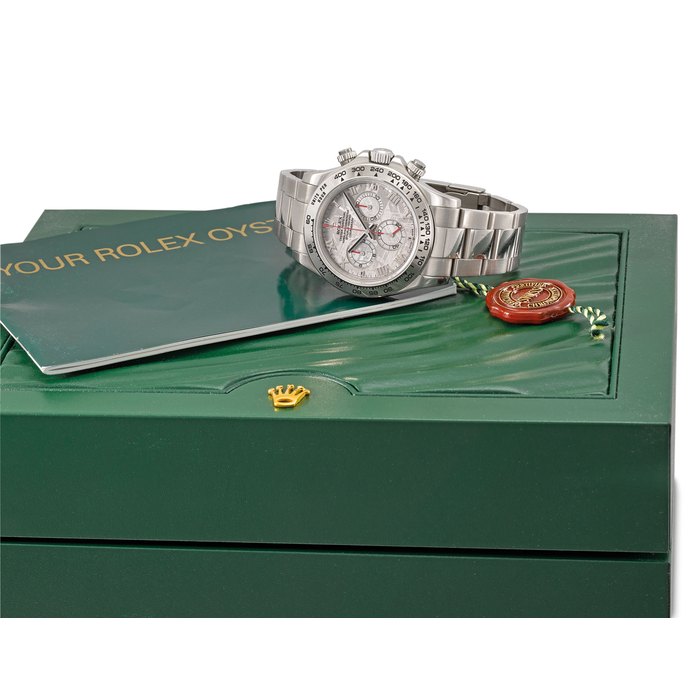 ROLEX. A VERY FINE AND RARE 18K WHITE GOLD AUTOMATIC CHRONOGRAPH WRISTWATCH WITH METEORITE DIAL, BRACELET AND BOX SIGNED ROLEX, OYSTER PERPETUAL, CHRONOGRAPH, DAYTONA, REF. 116509, CASE NO. Z070967, CIRCA 2007
