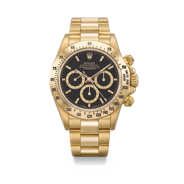 Rolex ROLEX. A VERY FINE AND RARE 18K GOLD AUTOMATIC CHRONOGRAPH WRISTWATCH WITH BLACK FOUR LINE INVERTED 6 DIAL AND BRACELET SIGNED ROLEX, OYSTER PERPETUAL, COSMOGRAPH, DAYTONA, REF. 16528, CASE NO. L236094, CIRCA 1989 · 16528