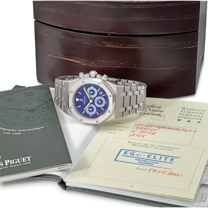 AUDEMARS PIGUET. A RARE TITANIUM LIMITED EDITION AUTOMATIC CHRONOGRAPH WRISTWATCH WITH DATE, BLUE DIAL, BRACELET, ORIGINAL GUARANTEE AND BOX SIGNED AUDEMARS PIGUET, ROYAL OAK, CITY OF SAILS, BE HAPPY MODEL, LIMITED EDITION, 300 PIECES, REF. 25860IS.0.1110IS.01, MOVEMENT NO. 485’091, CASE NO. E29112, CIRCA 2000