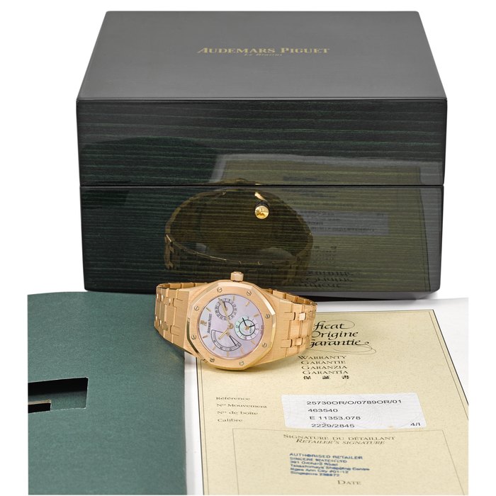 Audemars Piguet. A very fine, rare and attractive 18K pink gold automatic dual time wristwatch with power reserve, pink mother-of-pearl dial, original certificate and box Signed Audemars Piguet, Automatic, Royal Oak, No. 078, Ref. 25730OR.OO.0789OR.01, movement no. 463’540, case no. E11353, manufactured in 1999
