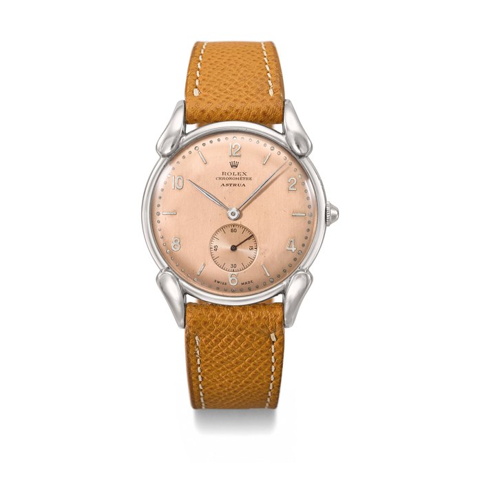 ROLEX. AN ELEGANT AND RARE STAINLESS STEEL WRISTWATCH WITH PINK “SALMON” COLORED DIAL SIGNED ROLEX, RETAILED BY ASTRUA, PRECISION MODEL, REF. 4560, CASE NO. 480’141, CIRCA 1947