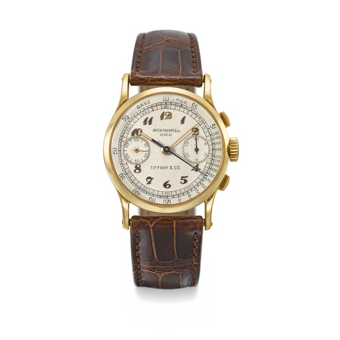 Patek Philippe. A very rare 18K gold chronograph wristwatch with two-tone silvered dial and Breguet numerals Signed Patek Philippe & Co., Genève, retailed by Tiffany & Co., Ref. 130, movement no. 863'887, case no. 646'773, manufactured in 1946