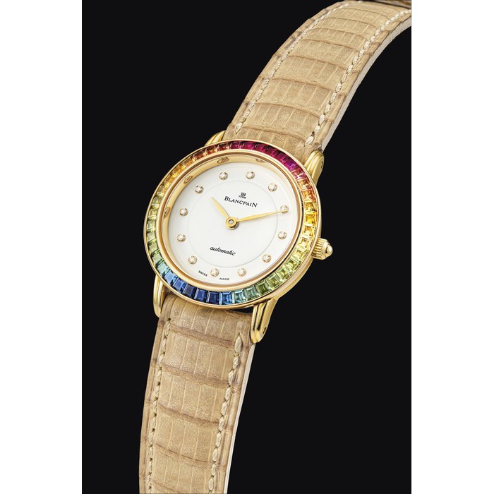 BLANCPAIN. A LADY'S 18K GOLD, DIAMOND AND RAINBOW-COLOURED MULTI GEM-SET AUTOMATIC WRISTWATCH SIGNED BLANCPAIN, AUTOMATIC, CASE NO. 1866, CIRCA 1990