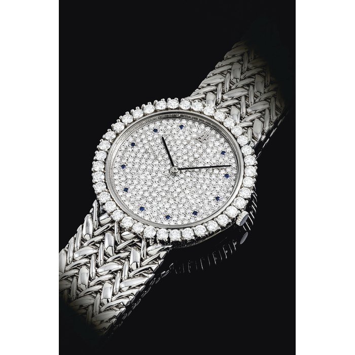 Audemars Piguet AUDEMARS PIGUET. A PLATINUM, DIAMOND AND SAPPHIRE-SET BRACELET WATCH SIGNED AUDEMARS PIGUET, REF. 14555PT, CASE NO. D 455, CIRCA 1996, Price & Market Data