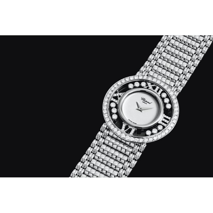 CHOPARD. AN 18K WHITE GOLD AND DIAMOND-SET BRACELET WATCH SIGNED CHOPARD, HAPPY DIAMONDS MODEL, CASE NO. 279'209, CIRCA 2002