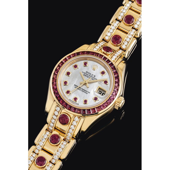 ROLEX. A LADY'S ATTRACTIVE AND VERY RARE 18K GOLD, DIAMOND AND RUBY-SET AUTOMATIC WRISTWATCH WITH SWEEP CENTRE SECONDS, DATE, BRACELET AND MOTHER-OF-PEARL DIAL SIGNED ROLEX, OYSTER PERPETUAL, DATEJUST, PEARLMASTER MODEL, REF. 80308, CASE NO. A659020, CIRCA 2000