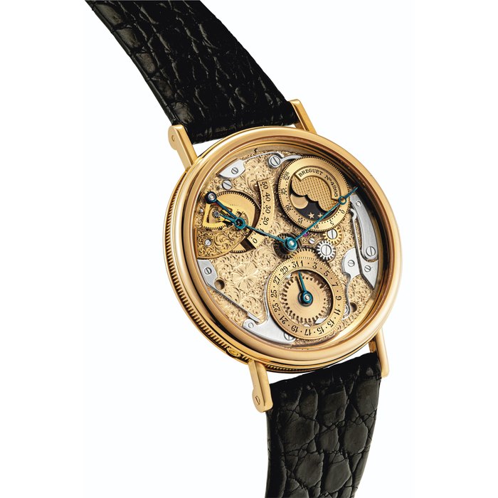 BREGUET. AN ATTRACTIVE 18K PINK GOLD AUTOMATIC SEMI-SKELETONISED WRISTWATCH WITH DATE, POWER RESERVE AND MOON PHASES SIGNED BREGUET, REF. 3135BR/00/286, MOVEMENT NO. 4109, CASE NO. 4268C, CIRCA 2000