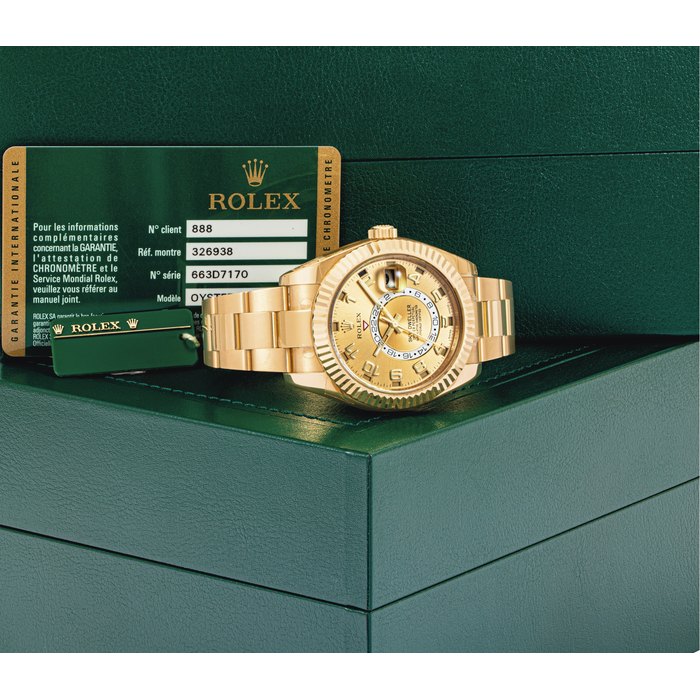 ROLEX. AN 18K GOLD AUTOMATIC ANNUAL CALENDAR WRISTWATCH WITH DUAL TIME, SWEEP CENTRE SECONDS AND BRACELET SIGNED ROLEX, OYSTER PERPETUAL, SKY-DWELLER MODEL, REF. 326938, CASE NO. 663D7170, CIRCA 2013