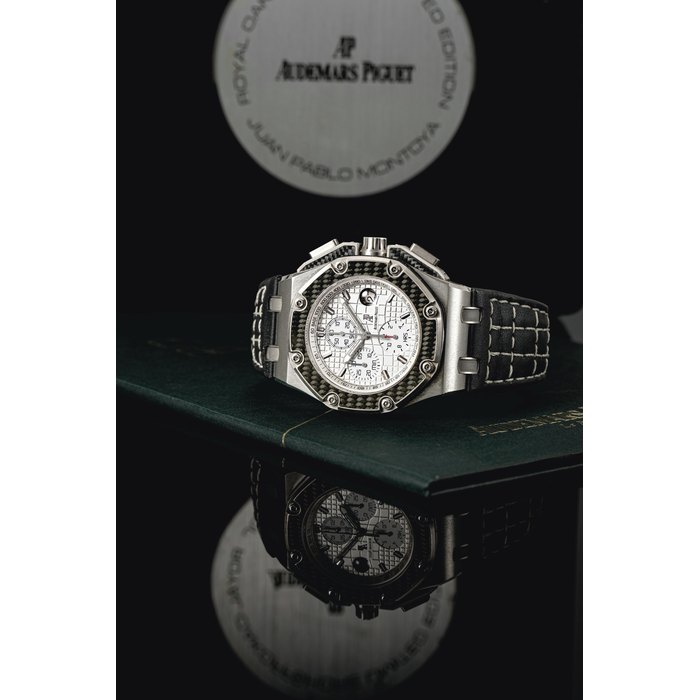 AUDEMARS PIGUET. A RARE TITANIUM AND CARBON LIMITED EDITION AUTOMATIC CHRONOGRAPH WRISTWATCH WITH DATE SIGNED AUDEMARS PIGUET, ROYAL OAK OFFSHORE JUAN PABLO MONTOYA MODEL, LIMITED EDITION, NO. 0256/1000, REF. 26030IO, MOVEMENT NO. 582’164, CASE NO. F23982, CIRCA 2004