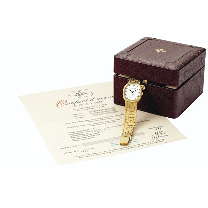 PATEK PHILIPPE. AN 18K GOLD OVAL BRACELET WATCH SIGNED PATEK PHILIPPE, GENEVE, ELLIPSE MODEL, REF. 3987/10, MOVEMENT NO. 1'817'664, CASE NO. 2'841'829, MANUFACTURED IN 1989