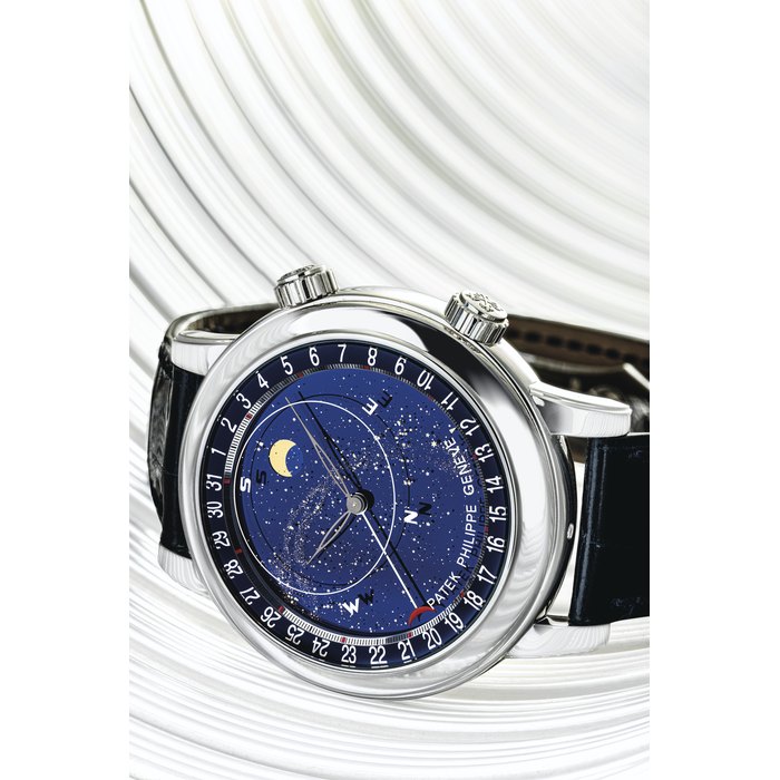PATEK PHILIPPE. AN IMPORTANT AND VERY RARE PLATINUM AUTOMATIC ASTRONOMICAL WRISTWATCH WITH SKY CHART, PHASES AND ORBIT OF THE MOON INCLUDING TIME OF MERIDIAN PASSAGE OF SIRIUS AND OF THE MOON AND DATE SIGNED PATEK PHILIPPE, GENEVE, CELESTIAL MODEL, REF. 6102, MOVEMENT NO. 5'822'892, CASE NO. 6’016'140, CIRCA 2014