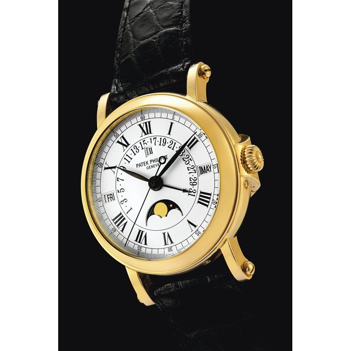 PATEK PHILIPPE. AN 18K GOLD AUTOMATIC PERPETUAL CALENDAR WRISTWATCH WITH SWEEP CENTRE SECONDS, RETROGRADE DATE, MOON PHASES AND LEAP YEAR INDICATION SIGNED PATEK PHILIPPE, GENEVE, REF. 5059, MOVEMENT NO. 1'957'566, CASE NO. 4'057'896, MANUFACTURED IN 1999