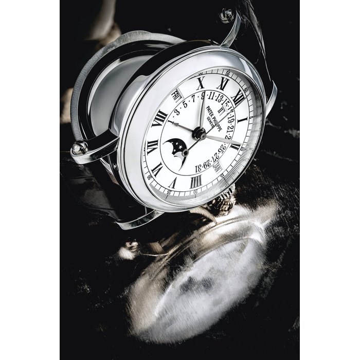 PATEK PHILIPPE. AN 18K WHITE GOLD AUTOMATIC PERPETUAL CALENDAR WRISTWATCH WITH SWEEP CENTRE SECONDS, RETROGRADE DATE, MOON PHASES AND LEAP YEAR INDICATION SIGNED PATEK PHILIPPE, GENEVE, REF. 5059, MOVEMENT NO. 1'958'114, CASE NO. 4'066'531, MANUFACTURED IN 1999
