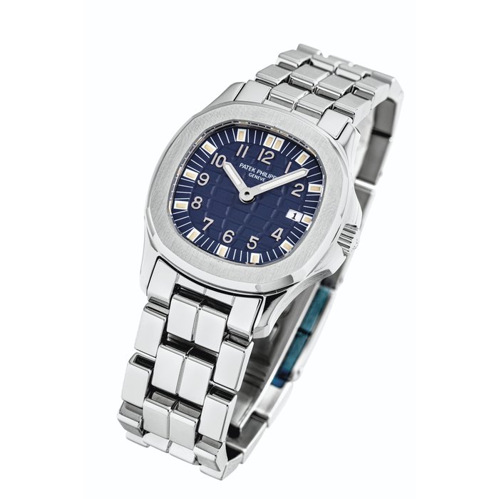 PATEK PHILIPPE. A LADY'S STAINLESS STEEL LIMITED EDITION CUSHION-SHAPED WRISTWATCH WITH DATE AND BRACELET, MADE FOR JAPANESE MARKET SIGNED PATEK PHILIPPE, GENEVE, AQUANAUT MODEL, REF. 4960, MOVEMENT NO. 1'538'644, CASE NO. 4'045'894, MANUFACTURED IN 1998