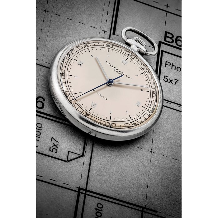 PATEK PHILIPPE. A STAINLESS STEEL KEYLESS LEVER WATCH WITH SWEEP CENTRE SECONDS, RETAILED BY GÜ BELIN MANUFACTURED IN 1929
