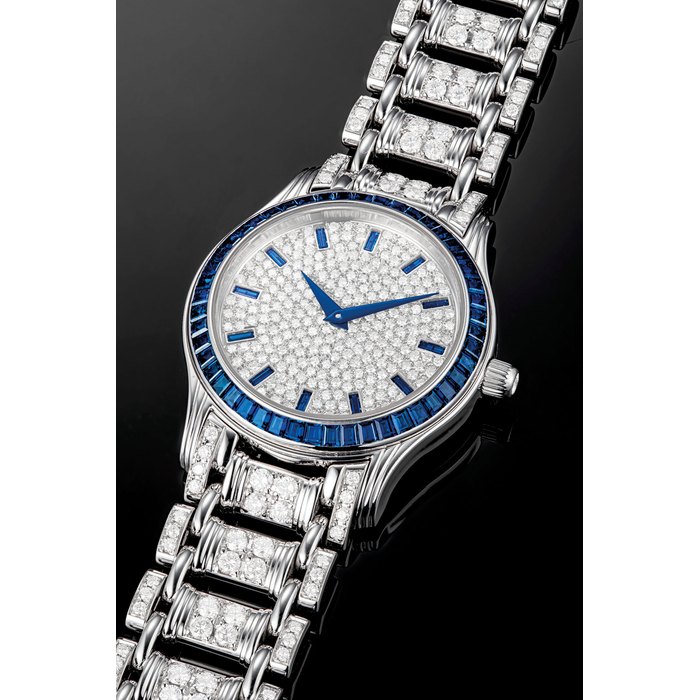 PIAGET. AN 18K WHITE GOLD, SAPPHIRE AND DIAMOND-SET BRACELET WATCH CIRCA 2001