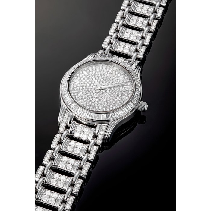PIAGET. AN 18K WHITE GOLD AND DIAMOND-SET BRACELET WATCH CIRCA 1998
