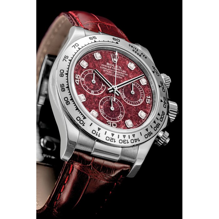 ROLEX. AN 18K WHITE GOLD AUTOMATIC CHRONOGRAPH WRISTWATCH WITH DIAMOND-SET GROSSULAR GARNET RUBELITE DIAL DAYTONA MODEL, REF. 116519, CIRCA 2008