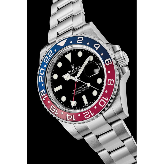 ROLEX. AN 18K WHITE GOLD AUTOMATIC DUAL TIME WRISTWATCH WITH SWEEP CENTRE SECONDS, DATE AND BRACELET GMT-MASTER II MODEL, REF. 116719BLRO, CIRCA 2014