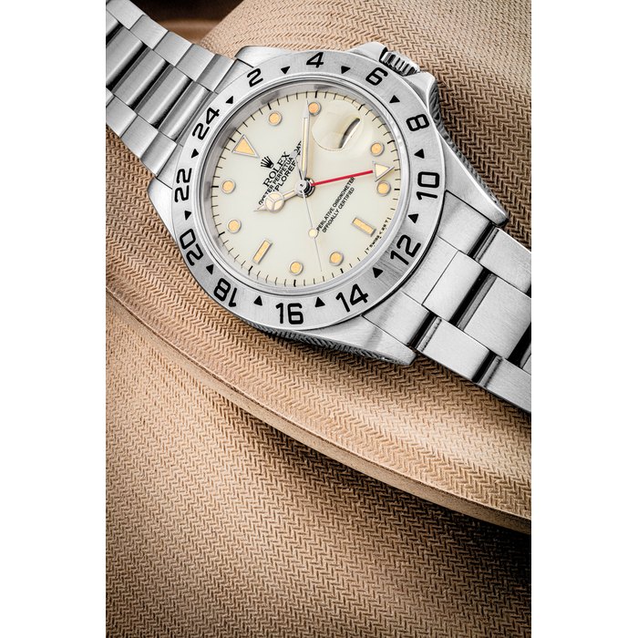 ROLEX. A STAINLESS STEEL AUTOMATIC DUAL TIME WRISTWATCH WITH SWEEP CENTRE SECONDS, DATE AND BRACELET EXPLORER II MODEL, REF. 16550, CIRCA 1985