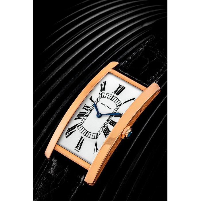 CARTIER. AN ELEGANT 18K GOLD RECTANGULAR WRISTWATCH TANK MODEL, CIRCA 1970