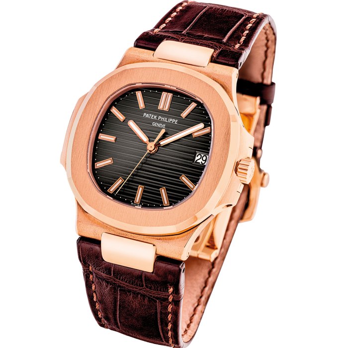 PATEK PHILIPPE. AN 18K PINK GOLD AUTOMATIC WRISTWATCH WITH SWEEP CENTRE SECONDS AND DATE NAUTILUS MODEL, REF. 5711, CIRCA 2009