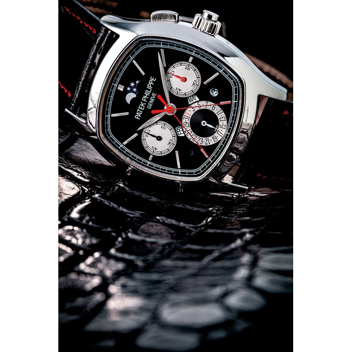 Patek Philippe PATEK PHILIPPE. AN EXTREMELY RARE PLATINUM CUSHION-SHAPED PERPETUAL CALENDAR SPLIT SECONDS CHRONOGRAPH WRISTWATCH WITH MOON PHASES, DAY/NIGHT AND LEAP YEAR INDICATION REF. 5951, CIRCA 2012, Price & Market Data