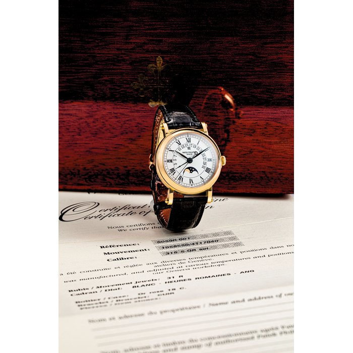 PATEK PHILIPPE. AN 18K PINK GOLD AUTOMATIC PERPETUAL CALENDAR WRISTWATCH WITH SWEEP CENTRE SECONDS, RETROGRADE DATE, MOON PHASES AND LEAP YEAR INDICATION REF. 5059, CIRCA 2001